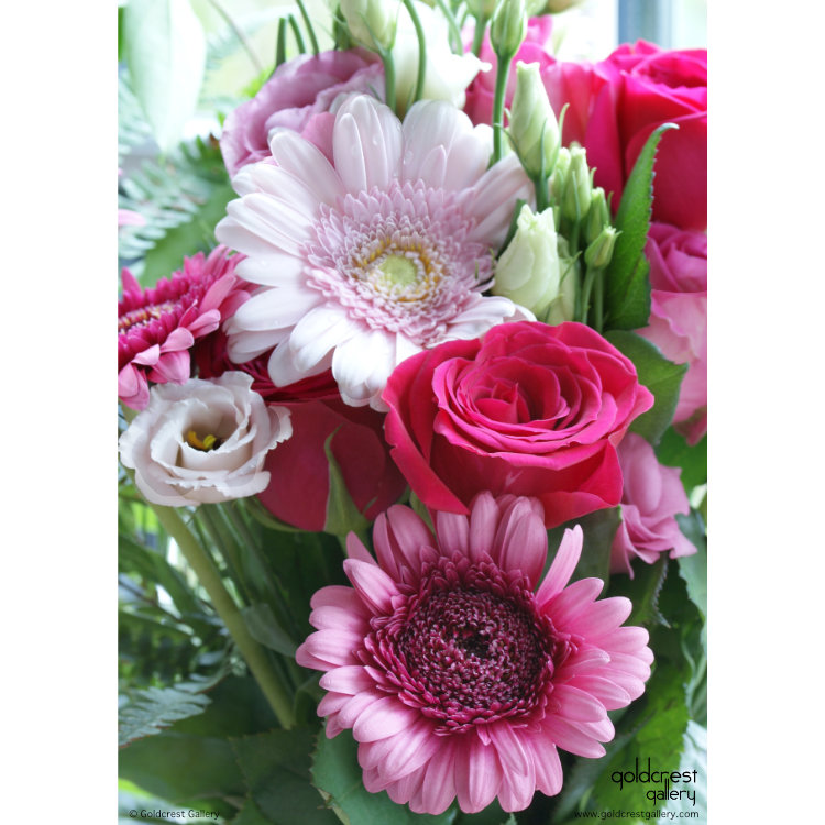 Back of greeting card with close up view of gerbera daisy, roses and lisianthus bouquet