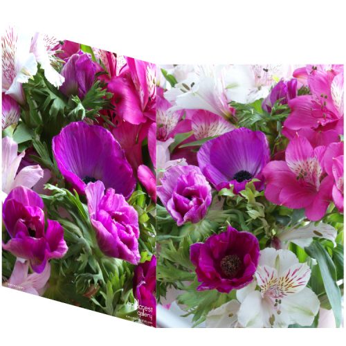 Two sides of a folded greeting card showing two views of purple anemones, pink and white lisianthus and green foliage