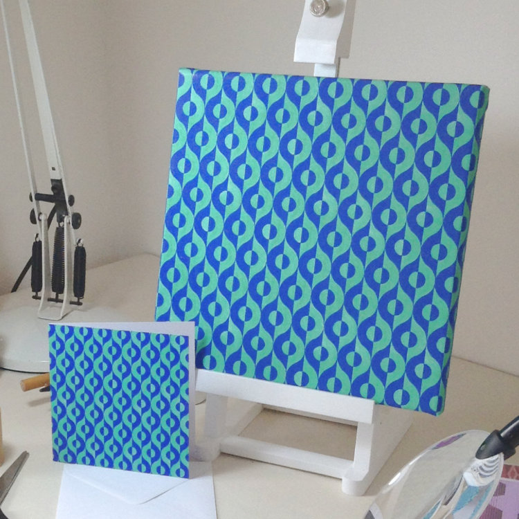 Photo of 10" canvas with Hemisphere design on easel stand